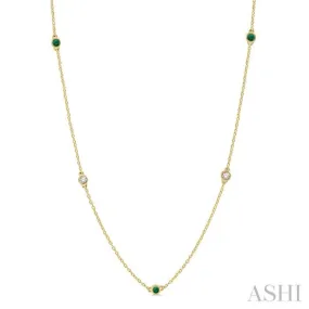 3/8 ctw Round Cut Diamond and 2.6MM Emerald Precious Station Necklace in 14K Yellow Gold