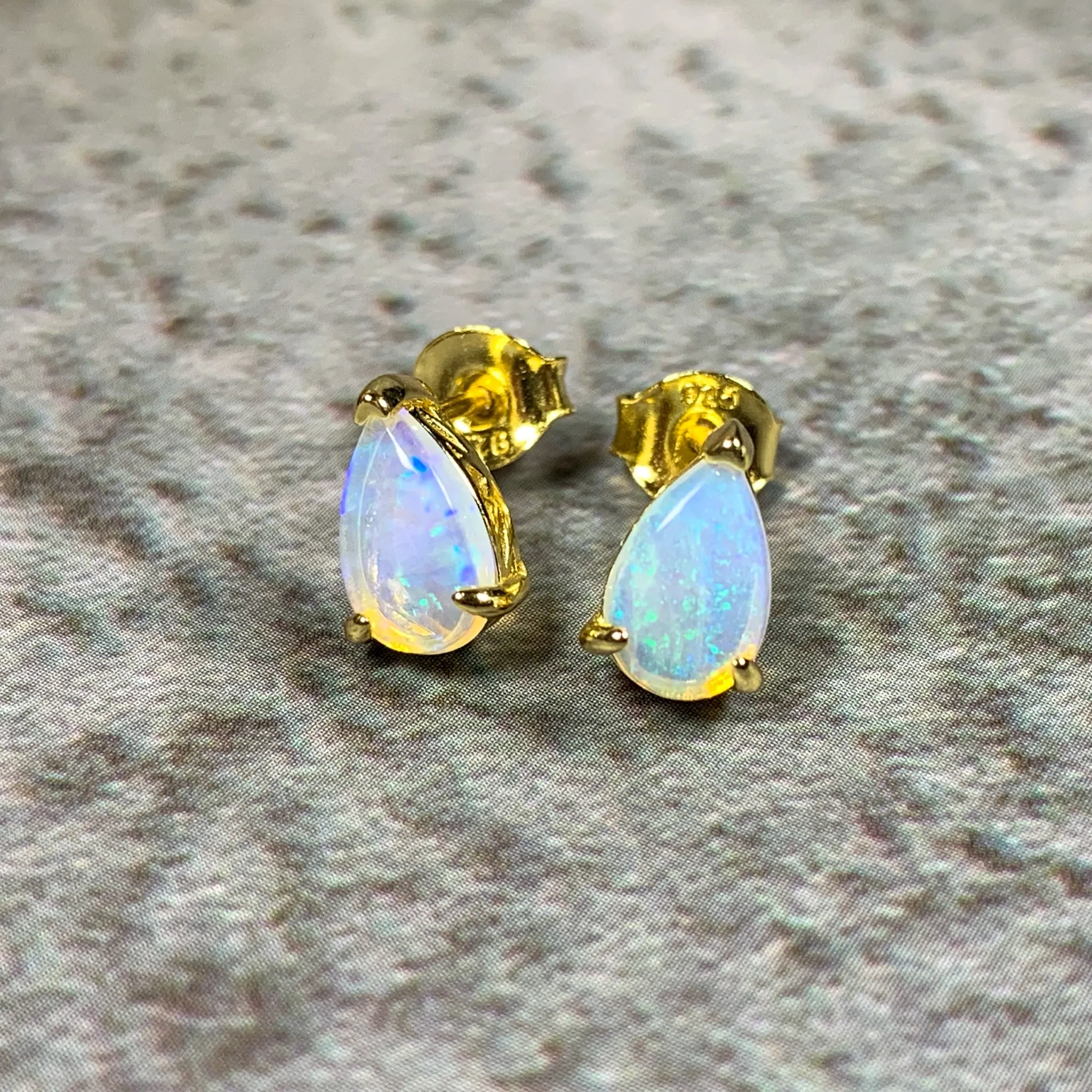 Gold plated silver 8x5mm pearshape White Opal studs
