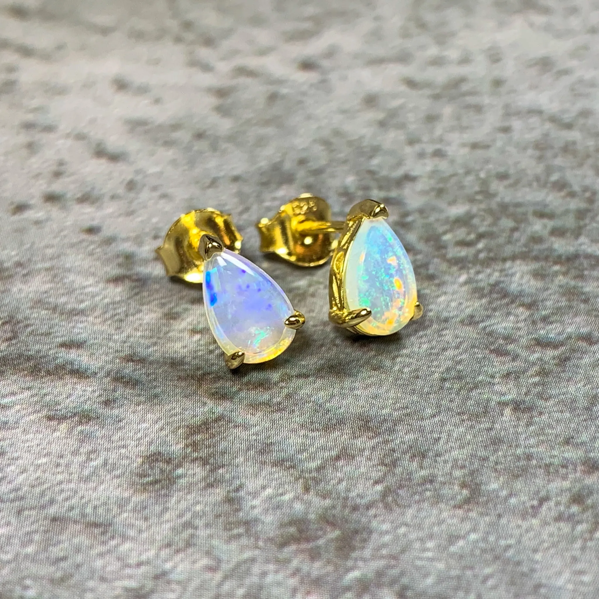 Gold plated silver 8x5mm pearshape White Opal studs