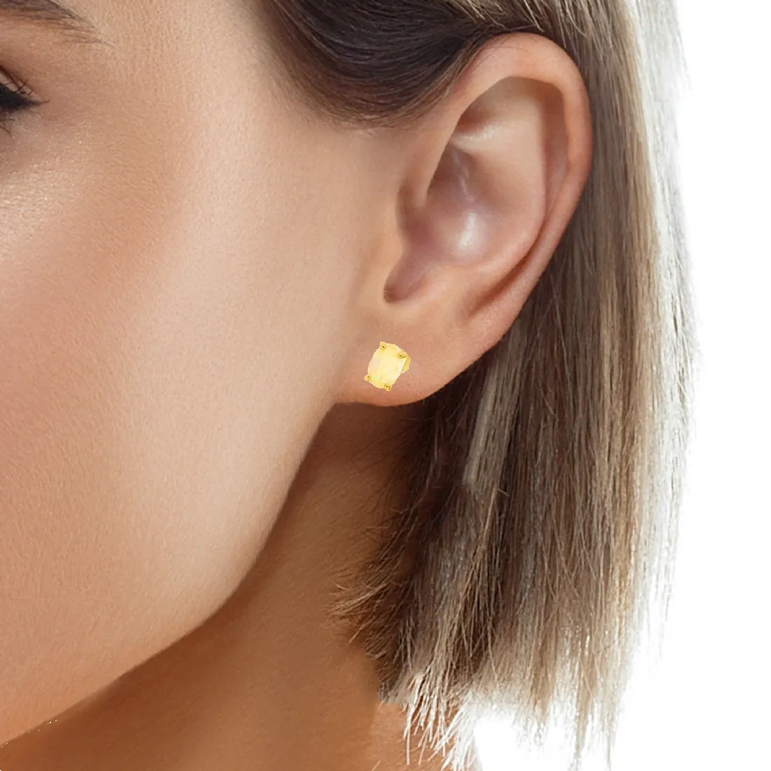 Pair of Gold plated silver 7x5mm White Opal studs