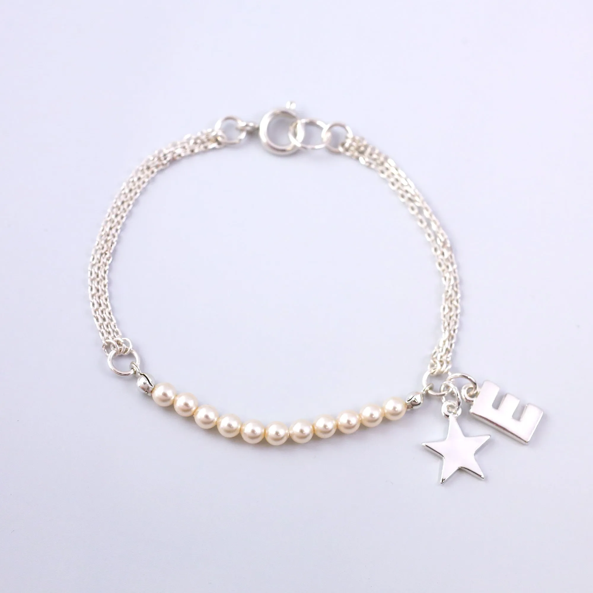 Personalised Silver Charm Bracelet Made with Pearls from Swarovski ®