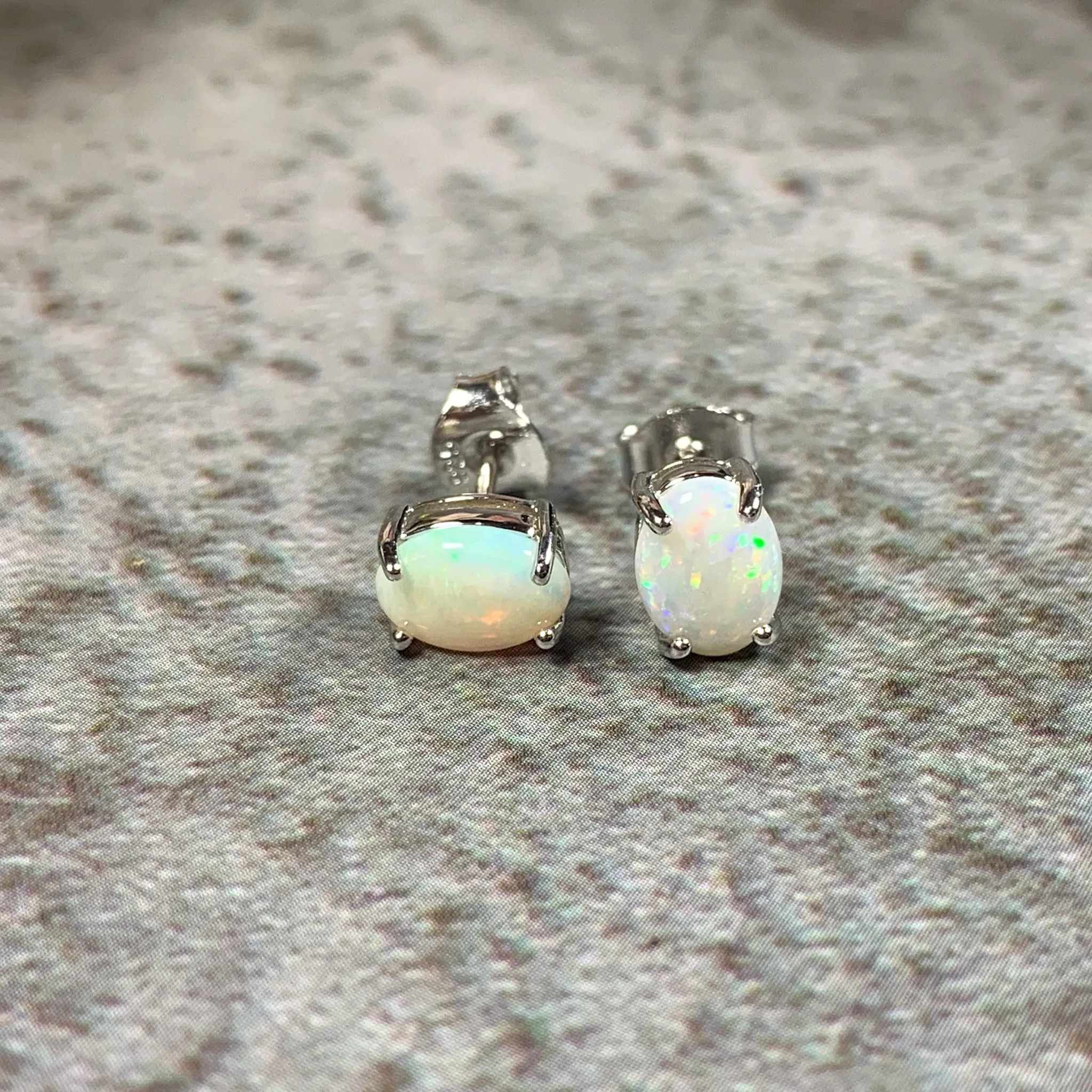 Sterling Silver 7x5mm White Opal claw studs