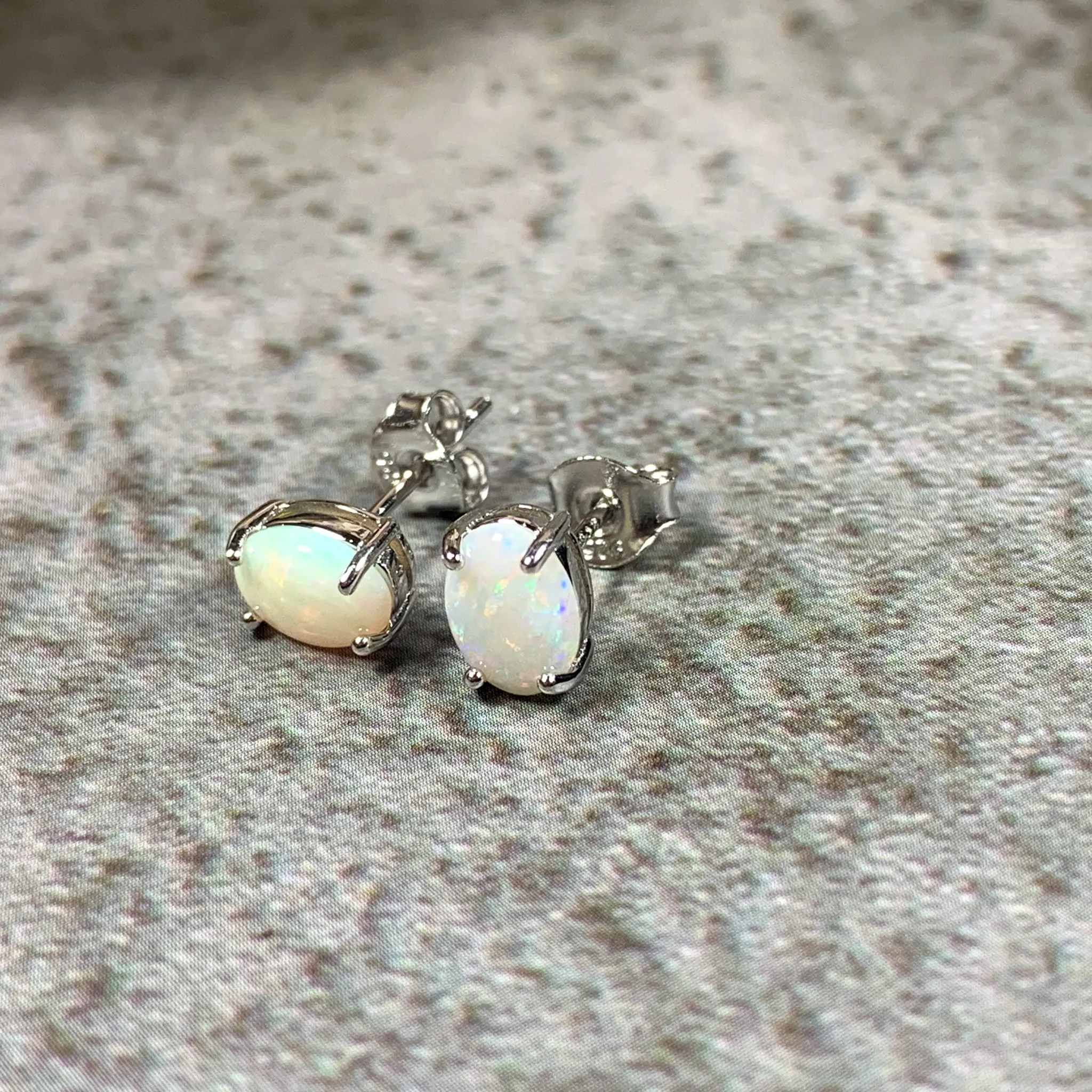 Sterling Silver 7x5mm White Opal claw studs