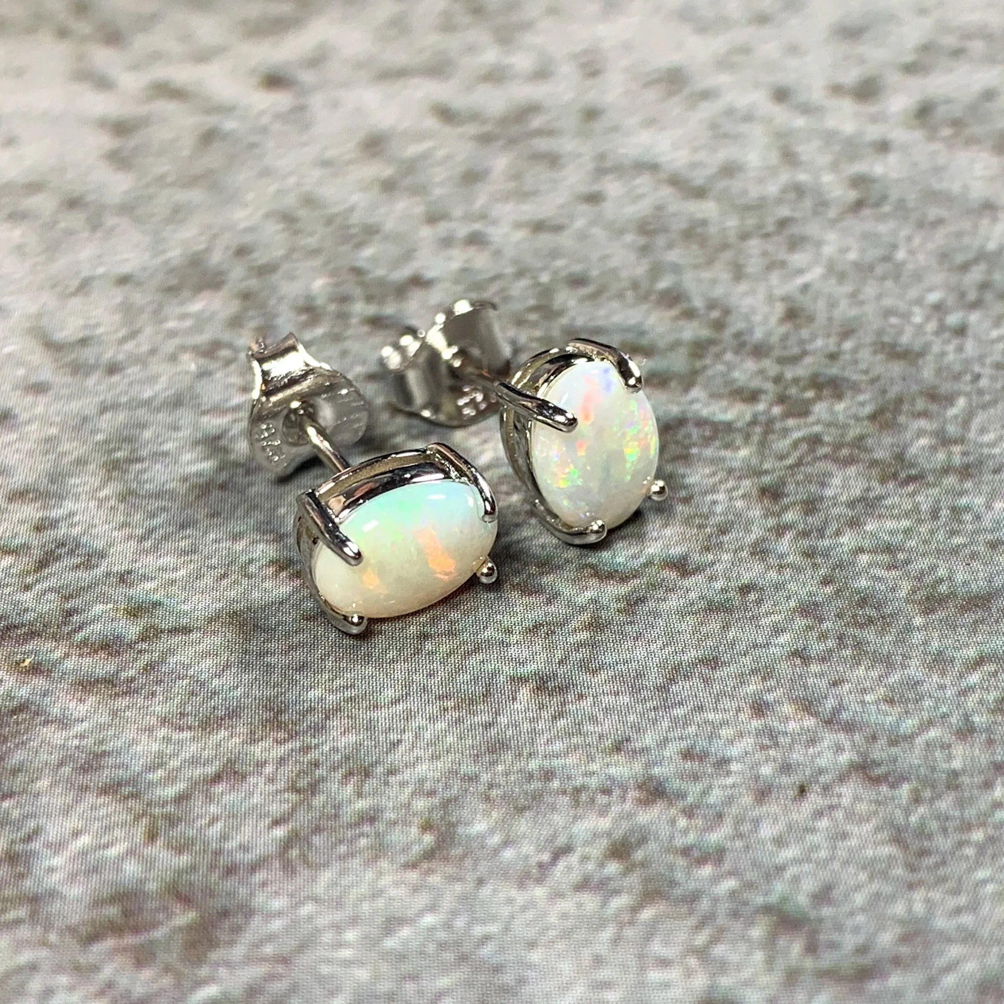 Sterling Silver 7x5mm White Opal claw studs