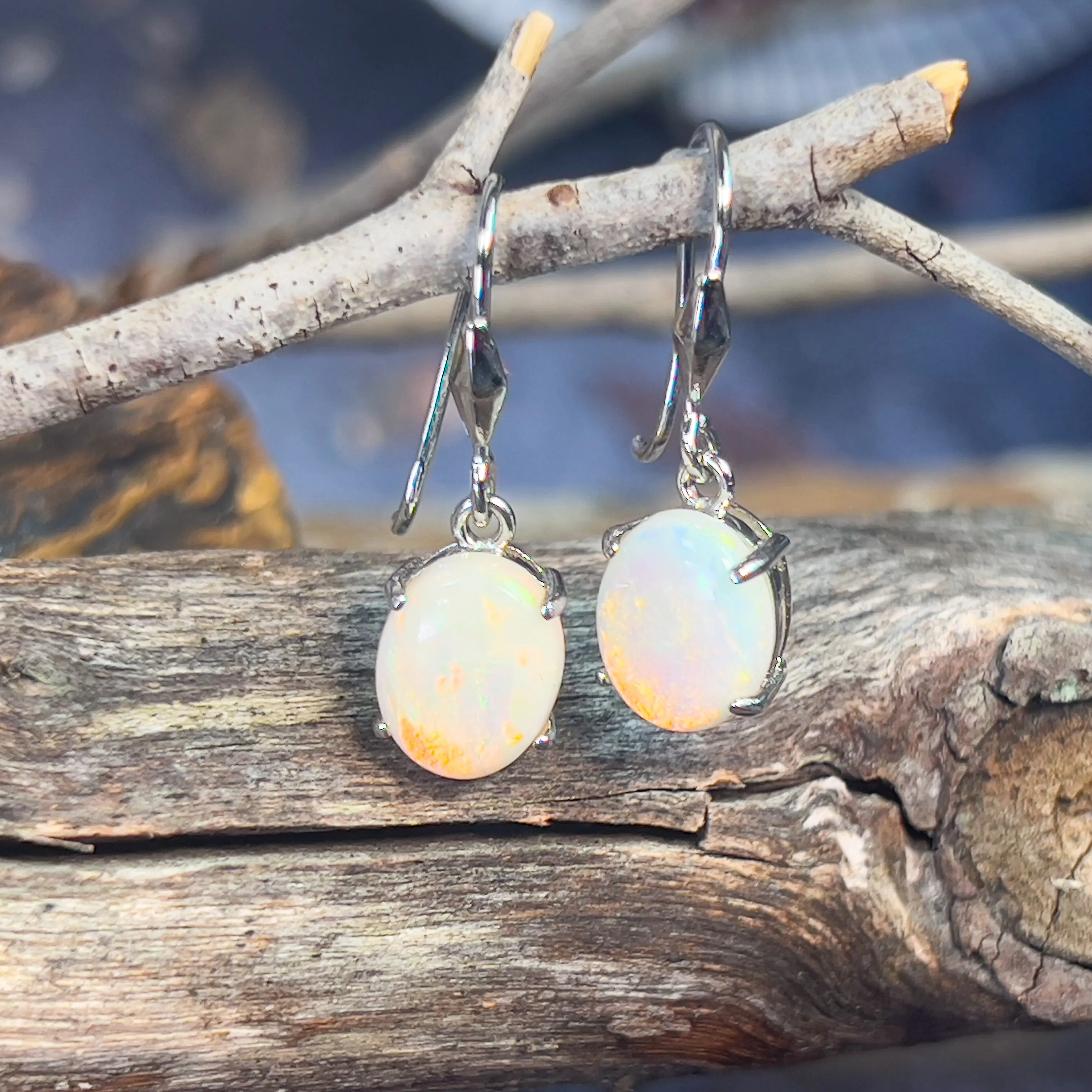 Sterling Silver dangling 10x8mm White Opal earrings
