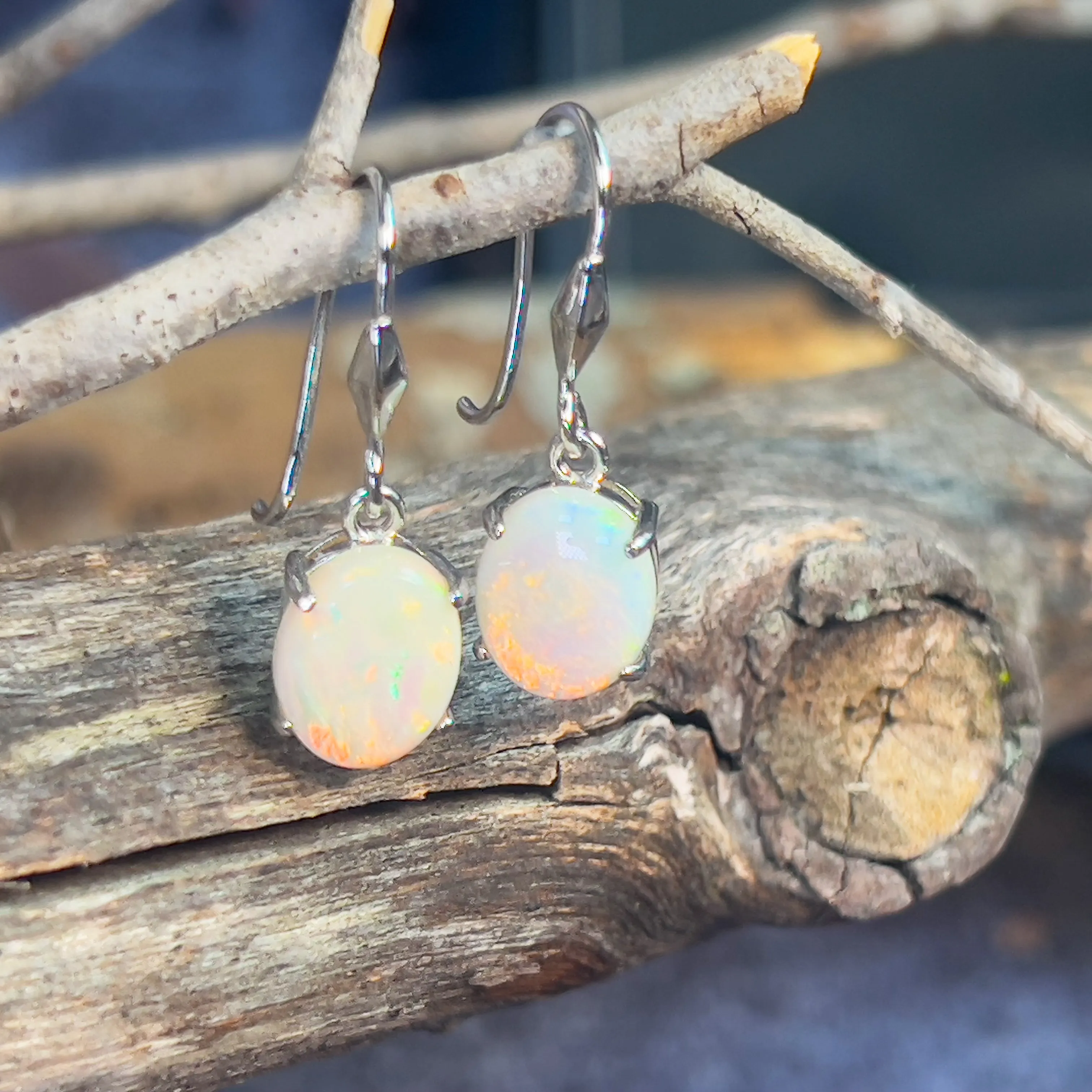 Sterling Silver dangling 10x8mm White Opal earrings