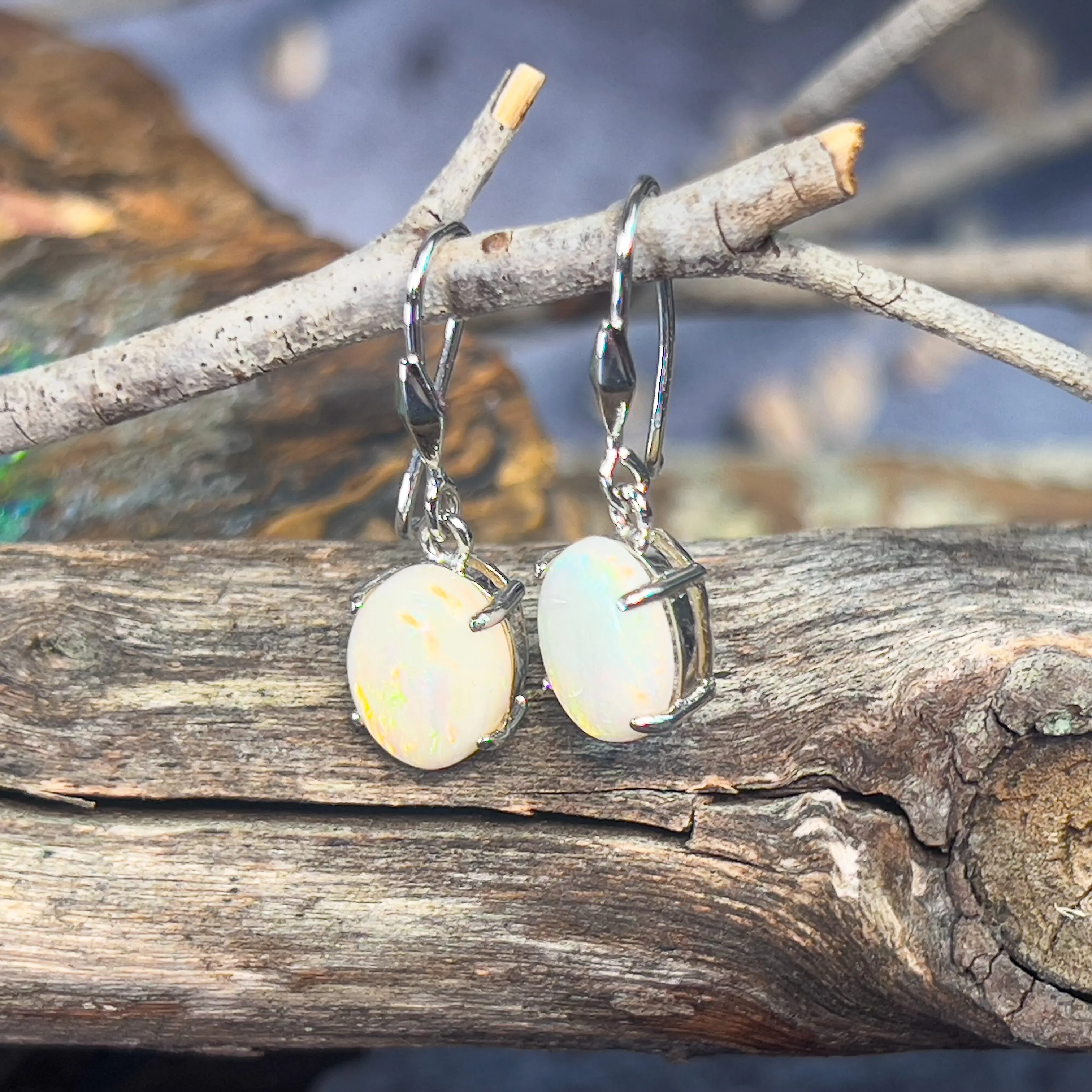 Sterling Silver dangling 10x8mm White Opal earrings