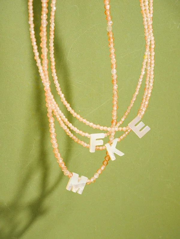 THE BEADED ALPHABET CHOKER IN NATURAL